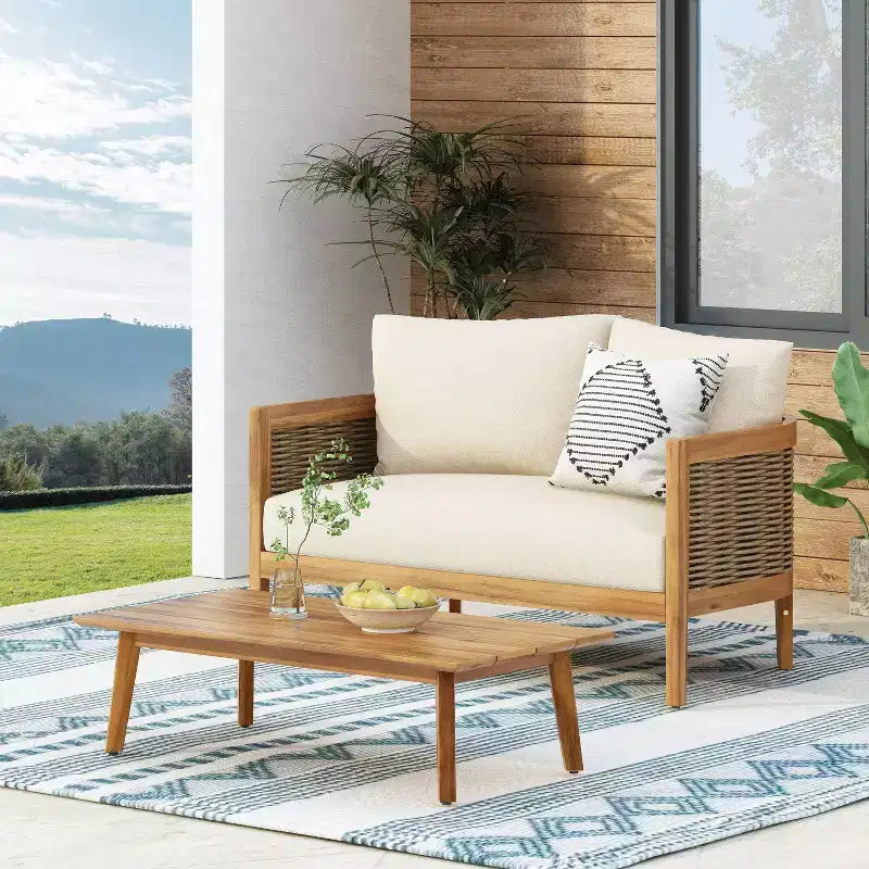 Christopher Knight Home Ensemble causeuse et table basse d'extérieur 2 pièces Burchett en bois d'acacia et rotin avec coussins