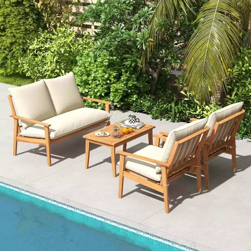 Ensemble de mobilier de patio Costway 4 pièces en bois d'acacia avec coussins moelleux et table basse