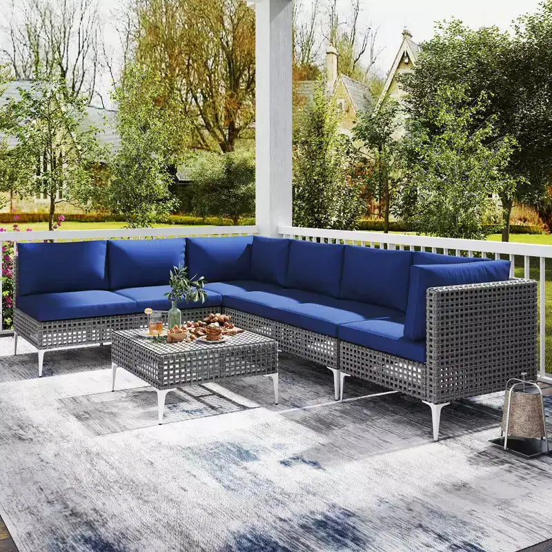Ensemble de meubles d'extérieur 7 pièces Costway avec coussins d'assise et de dossier, table basse en verre trempé, bleu marine/gris