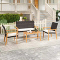 Costway 4 PCS Patio Furniture Set with Acacia Wood Coffee Table & Soft Cushions for Garden