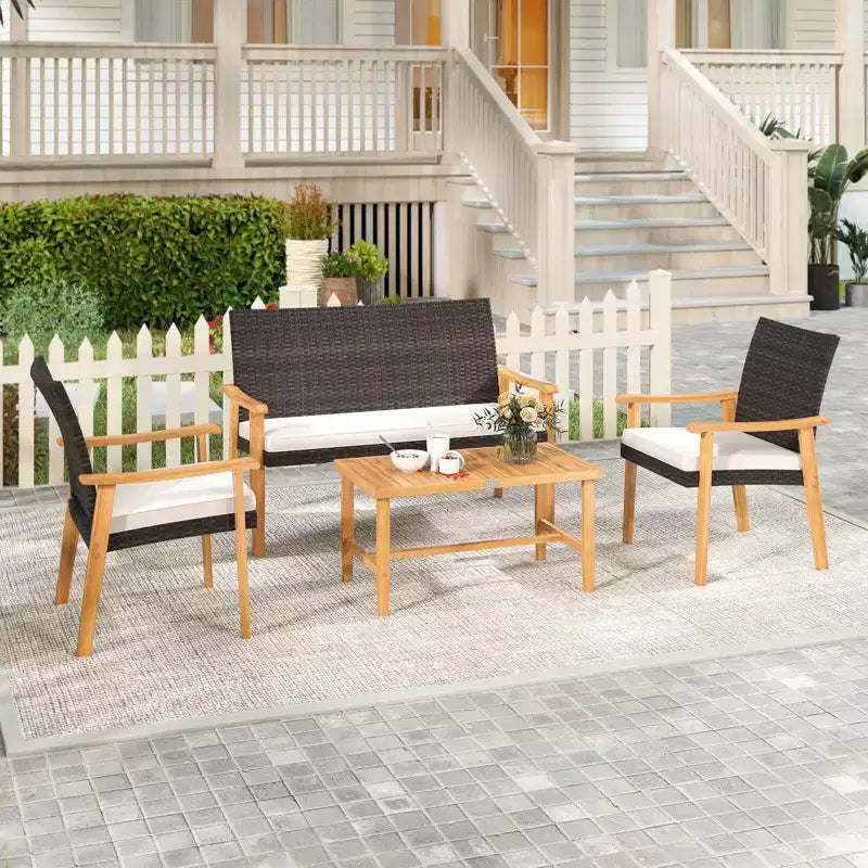 Costway 4 PCS Patio Furniture Set with Acacia Wood Coffee Table & Soft Cushions for Garden