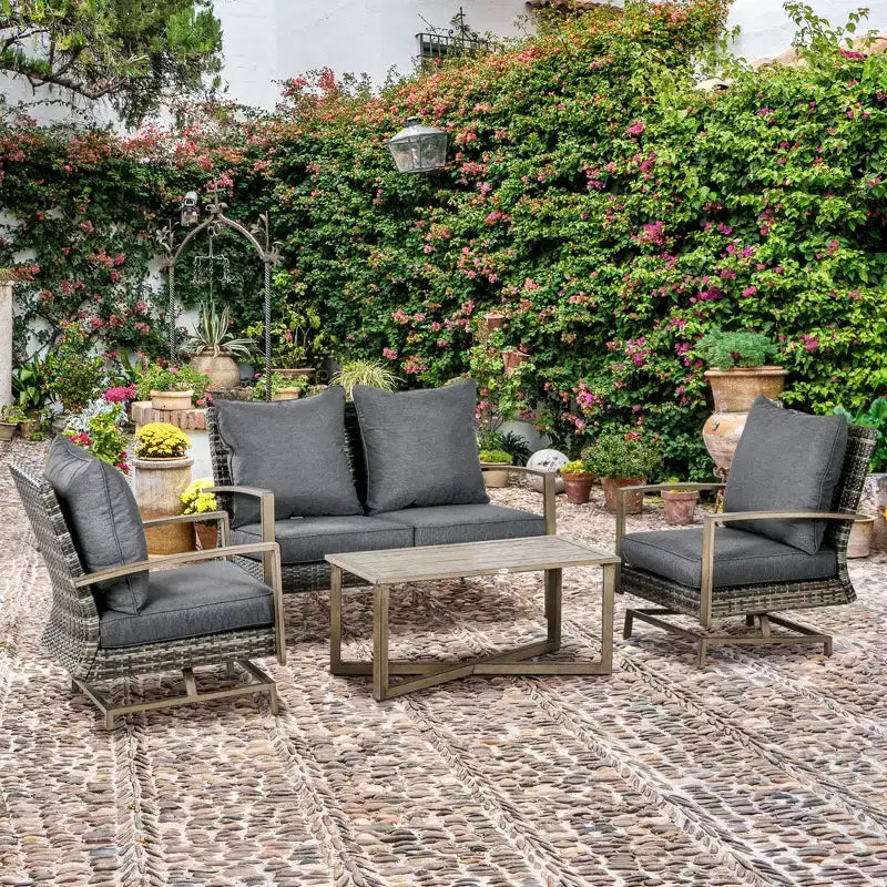 Ensemble de meubles de patio Outsunny, ensemble de conversation de jardin 4 pièces en rotin avec 2 fauteuils à bascule, coussins, canapé et table basse