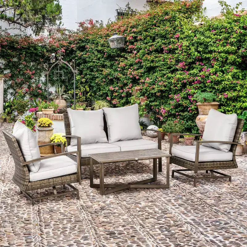 Ensemble de meubles de patio Outsunny, ensemble de conversation de jardin 4 pièces en rotin avec 2 fauteuils à bascule, coussins, canapé et table basse